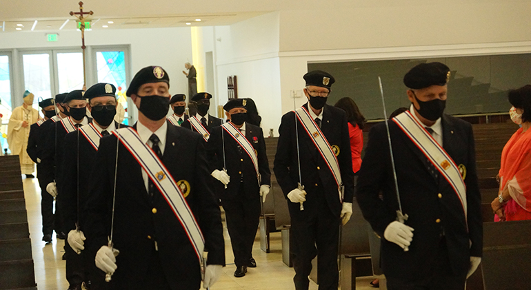 Knights of Columbus provide an honor guard at the start of the Memorial Day Mass celebrated by Archbishop Thomas Wenski at Our Lady of Guadalupe Church in Doral, May 31, 2021.