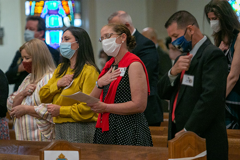 Graduates of the School of Lay Formation pray during their graduation Mass, celebrated by Archbishop Thomas Wenski  June 5, 2021 at St. Mary Cathedral.

Archbishop Thomas Wenski presided at a Mass and graduation ceremony for the 2020 and 2021 School of Lay Formation classes, June 5, 2021 at St. Mary Cathedral. The graduation ceremony for the class of 2020 was postponed last year due to COVID-19.