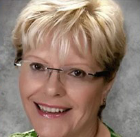 St. John Neumann School principal Maria Elena Vilas is retiring this June after 38 years in Catholic education.