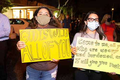 St. Joseph Parish in Miami Beach and the parish youth ministry group hosted a eucharistic prayer and candlelight vigil June 26, 2021, including a walk through the neighborhood and close to the site of the Champlain Towers South partial collapse.