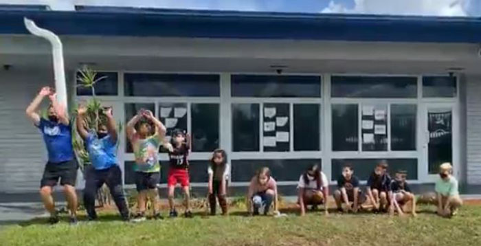 June 2021
Deerfield Beach
Here comes the wave: Coach Sean McKeown from St. Ambrose School and students “wave” good-bye to the 2021 academic year.