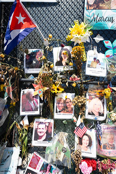 One month after the tragic Surfside condo collapse, an ever-evolving "wall of remembrance" nearby commemorates the lives of the 97 victims identified so far in the June 24, 2021 tragedy.