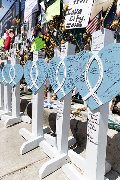 One month after the tragic Surfside condo collapse, an ever-evolving "wall of remembrance" nearby commemorates the lives of the 97 victims identified so far in the June 24, 2021 tragedy.