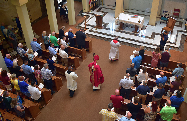 Archbishop Thomas Wenski enters the Ascension Mausoleum chapel in procession to say Mass for the Catholic Cemetery Conference in Doral, Sept. 21, 2021.