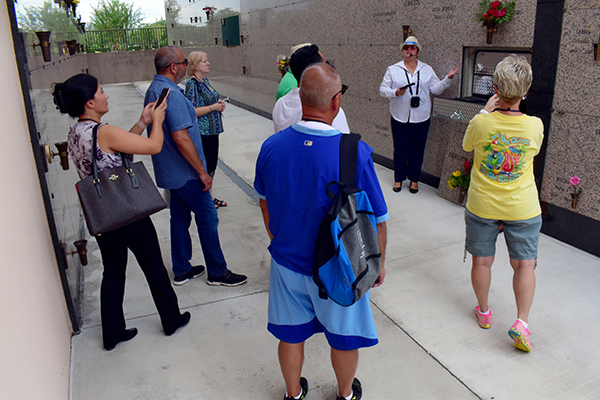 Counselor Marbelys Grecco leads attendees of the Catholic Cemetery Conference to a mausoleum at Our Lady of Mercy Cemetery, Sept. 21, 2021.