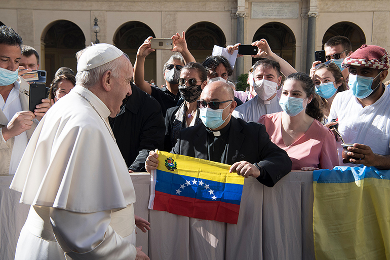 Pope Francis greets a group from Venezuela during his weekly general audience in the Paul VI Hall at Vatican City on Aug. 25, 2021.