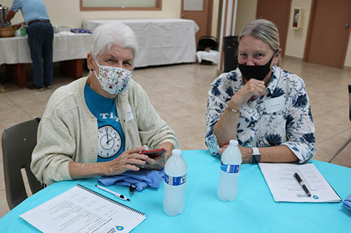 Libby Johnson, left, and Myra Puccio attend the Sidewalk Advocacy Training Sept. 11, 2021 at the Madonna Retreat Center in West Park. Johnson is a retired delivery room nurse. She was there to learn how to be an effective sidewalk advocate near an abortion clinic where she has prayed for the past six years.