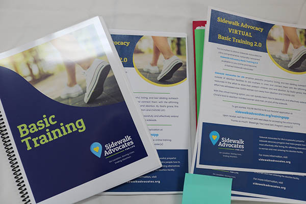 Training materials are displayed on tables as part of the Sidewalk Advocacy Training offered Sept. 11, 2021 at the Madonna Retreat Center in West Park.