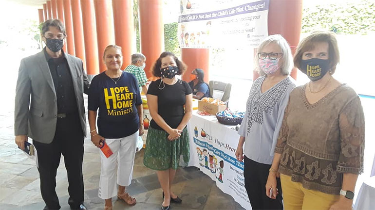 Recruiting foster parents after Masses Sept. 12, 2021, Grandparents Day, at St. John Neumann Church in Miami, from left: attorney Harrison Griffis and Hope, Heart & Home Guardian ad litem Maria Jacques, Ada Avallone, Malvina Longoria, and Valerie Van Ostran.