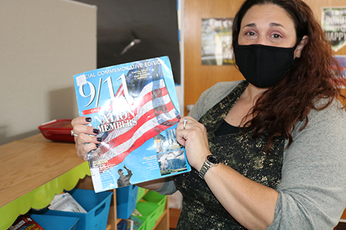 Tara Bartos, a librarian and technology and media specialist at St. Ambrose School, talked with her students about 9/11 and shared stories about her family members in New York at the time.