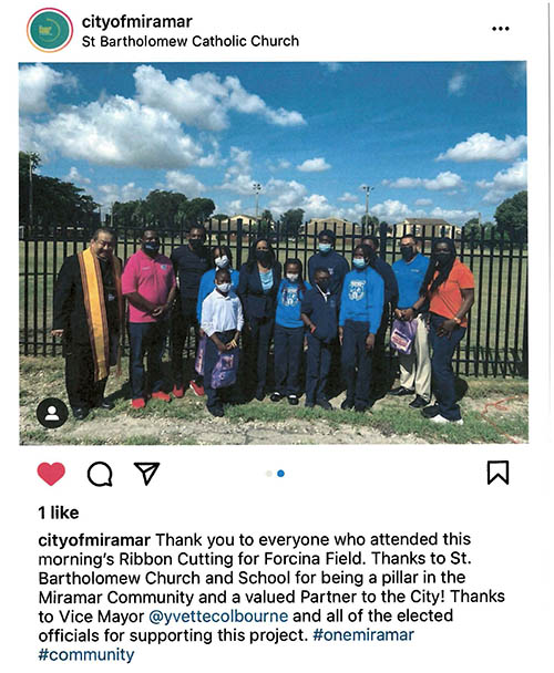 Image from City of Miramar's Instagram page shows St. Bartholomew's pastor, Father Andrew Chan-A-Sue, far left, and school students with City of Miramar officials, including Vice Mayor Ivette Colbourne, center.