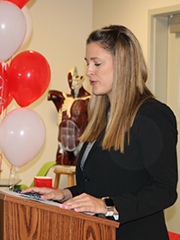 Katrina Azevedo, assistant principal at Cardinal Gibbons High School, talks about the new Emergency Medical Technician program kicking off at the school during the ribbon-cutting Sept. 24, 2021.