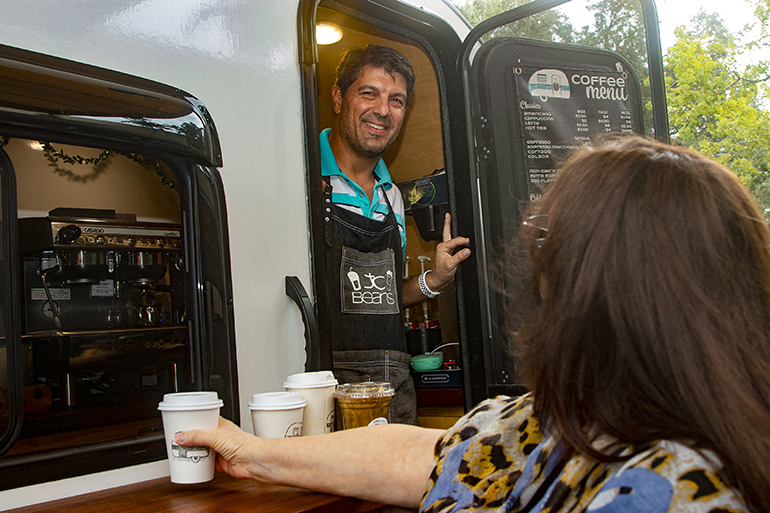 Demian Bowman, owner of JC Beans Mobile Cafe, provides a caffeinated break to archdiocesan employees when he stopped by the Pastoral Center on Oct. 1, 2021, International Coffee Day.