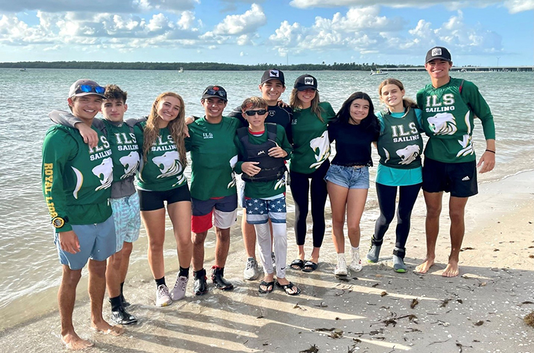 Immaculata-La Salle High School's sailors pose for a photo at the first district regatta of the season, held at Historic Virginia Beach Key Park.