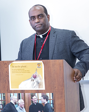 Father Reginald Jean-Mary, pastor of Notre Dame d'Haiti Mission in Miami, leads one of the Creole-language sessions at the Stewardship and Ambassadors of First Impressions Day, hosted by the Office of Development and held at Belen Jesuit Prep Oct. 2, 2021,