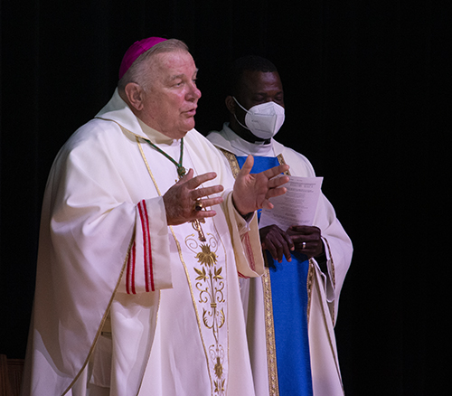 Archbishop Thomas Wenski speaks at the start of the Mass for more than 250 volunteers and parish staff who gathered at Belen Jesuit Prep Oct. 2, 2021, for the Stewardship and Ambassadors of First Impression Day hosted by the archdiocesan Office of Development.