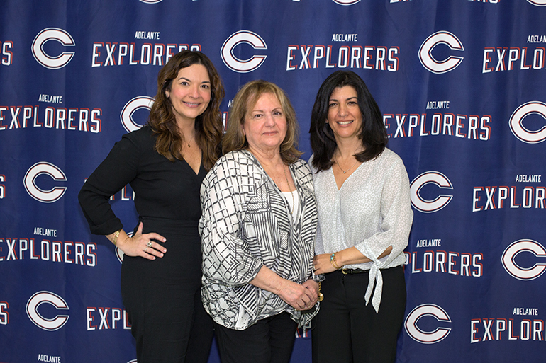 From left: Hope Diaz, her mother, Esperanza Diaz, and sister, Christina Diaz Gonzalez, pose for a photo after announcing the Delfin J. Diaz Marist Service Award in honor of their late father and husband, at Christopher Columbus High School, Oct. 13, 2021.