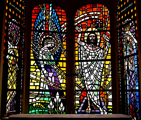 Resurrection window stands behind the main altar at Our Lady of Mercy Cemetery in Doral.