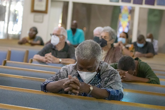 Theresa Simon, parishioner at St. Bartholomew Church in Miramar, prays during the Mass that marked the start of Black Catholic History Month, Nov. 6, 2021.