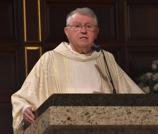 Msgr. Jude O'Doherty gives the homily during the 70th anniversary Mass at Epiphany Church, South Miami. Msgr. O'Doherty served as  pastor at the church from 1982 until his retirement in 2019.