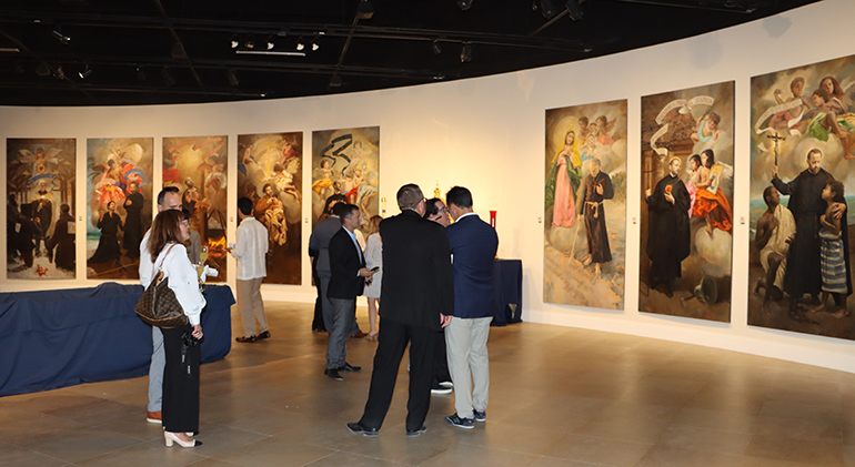 After the cornerstone blessing, guests at Belen Jesuit Prep tour the “Art in Worship” exhibit in the school’s Saladrigas Gallery. The exhibit features the sacred art which will be installed in Our Lady of Belen Chapel once construction is completed sometime in 2022.