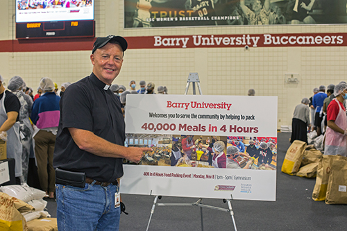 Dominican Father Dave Caron is Cross Catholic Outreach's director of Spiritual Engagement. He took part in an event Nov. 8, 2021 at Barry University where students and staff packed "40,000 Meals in 4 Hours." The meals were to be distributed by Cross Catholic Outreach to the poor in Haiti and South Florida.