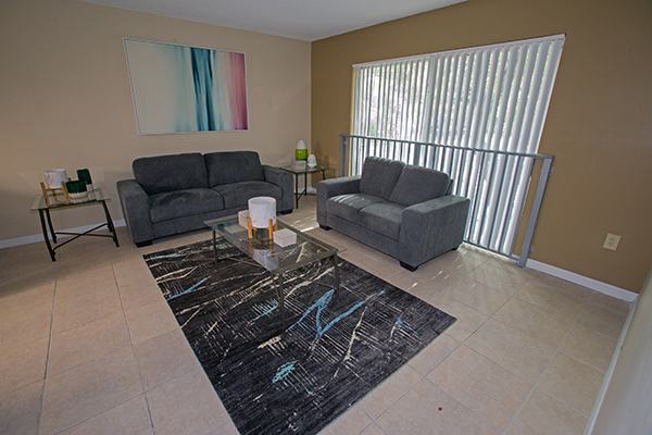 Living room of the Somerville Residence apartment that is now home to two formerly homeless veterans, Rodney Grant and Darnell Metcalf.