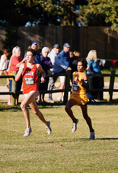 Belen Jesuit sophomore Joshua Ruiz runs neck and neck with Leon's Patrick Koon at the state cross-country championships, held Nov. 12, 2021 in Tallahassee. Koon came in first and Ruiz came in second, helping Belen to its fifth straight state title, and 13th overall.