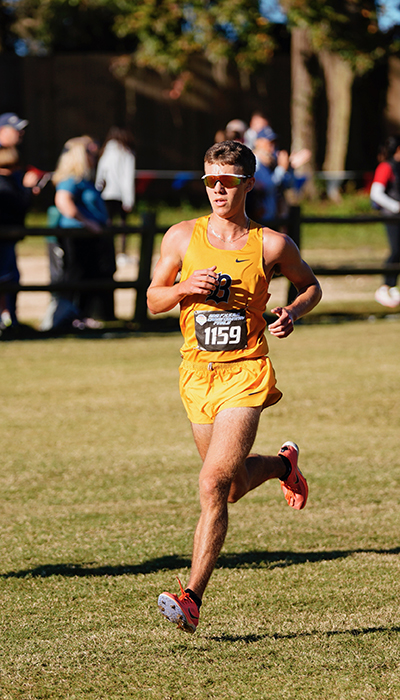 Belen Jesuit senior Adam Magoulas guides the Wolverines to a 42-point finish, easily beating Fort Myers' 132 total at the state cross country championships Nov. 12, 2021. Magoulas has played a part in the last five Wolverines titles.