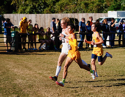 Belen Jesuit freshman Joey Diaz-Quintero, front, and senior Julian Rodriguez run toward the finish line at the state cross-country championships, held Nov. 12, 2021 in Tallahassee. Belen came away with its fifth straight title, and 13th overall.