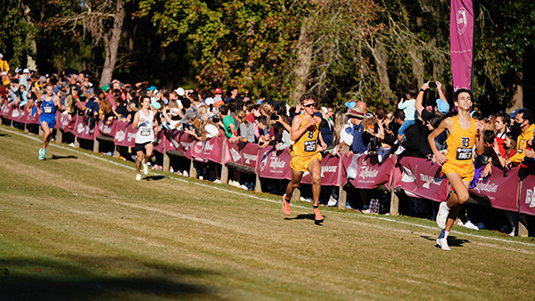 Belen Jesuit senior Adam Magoulas, rear, and sophomore Evan Torres run toward a ninth and tenth place finish, respectively, at the state cross-country championships, held Nov. 12, 2021 in Tallahassee. The Wolverines won their fifth straight title, and 13th overall, by finishing all five scoring runners in the top seven. No other school had more than two in that range.
