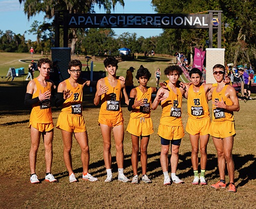 Members of Belen Jesuit's cross-country team hold up the "5" sign after winning the school's fifth straight title, and 13th overall, at the state cross-country championships, held Nov. 12, 2021 in Tallahassee. From left: junior Alec Torricella, junior Roberto Leon, sophomore Evan Torres, sophomore Joshua Ruiz, senior Julian Rodriguez, freshman Joey Diaz-Quintero and senior Adam Magoulas.