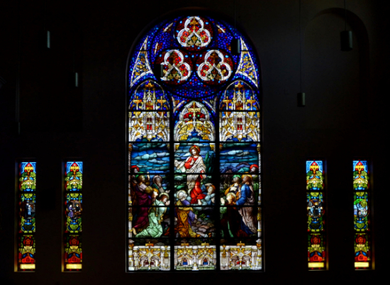 The ascension of Jesus is the theme of the right transept at St. John Bosco Church.