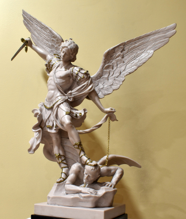 The archangel Michael, clad in Roman-style armor, chains Satan in this statuette, as the Bible says he will on Judgment Day.