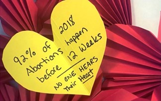 Yellow hearts with eye-opening bits of information decorated some classroom doors at Archbishop Coleman Carroll High School in Miami as part of the students' participation in the October 2021 Baby Bottle Campaign to raise funds for the archdiocese's Respect Life Ministry.