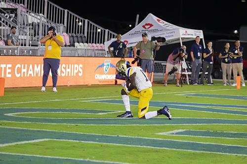 St. Thomas Aquinas wide receiver Isaiah Hardge (17) kneels after scoring the team's fifth touchdown during the Class 7A State Championship game between Aquinas and Tampa Bay Tech at DRV PNK Stadium in Fort Lauderdale, Dec. 17, 2021. Aquinas won the championship with a final score of 42-14.