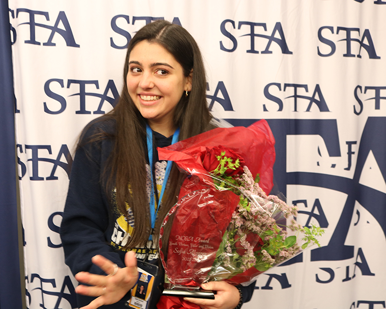 Sofia Alvarez, a senior at St. Thomas Aquinas High School in Fort Lauderdale, is all smiles after hearing that she received an award from the National Catholic Educational Association, Jan. 31, 2022.