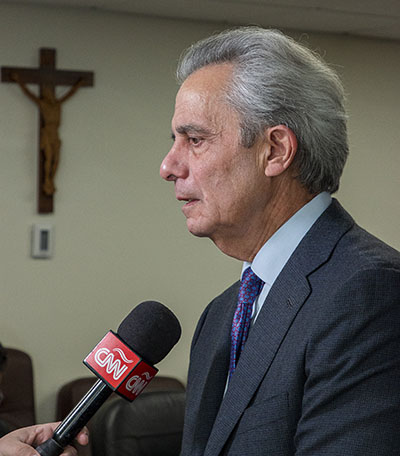 Tony Argiz, a now-adult Pedro Pan, prominent Miami businessman and philanthropist, joined Archbishop Thomas Wenski, other business leaders, community leaders, immigration advocates and former Pedro Pans, in a press conference asking Gov. Ron DeSantis to revoke an executive order that threatens to close down shelters that house unaccompanied minors in Florida after they are caught at the border by immigration authorities. The press conference took place Feb. 10, 2022 in the offices of the Pastoral Center of the Archdiocese of Miami.