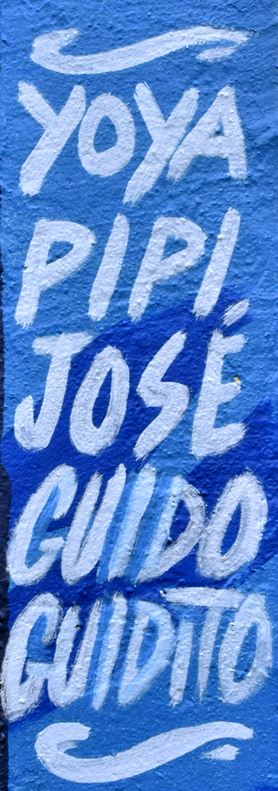 The new mural at St. John the Apostle School includes the names of Henry Garcia’s family. Garcia, an alumnus of St. John, made the mural possible by his donation.