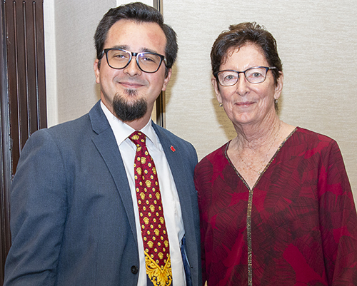 Oscar Cedeño, principal of Cardinal Gibbons High School in Fort Lauderdale and this year's honoree, poses with Mary Weber, chair of the Scholarship Committee during the Miami Archdiocesan Council of Catholic Women's annual scholarship luncheon, held Feb. 19, 2022 in Fort Lauderdale.