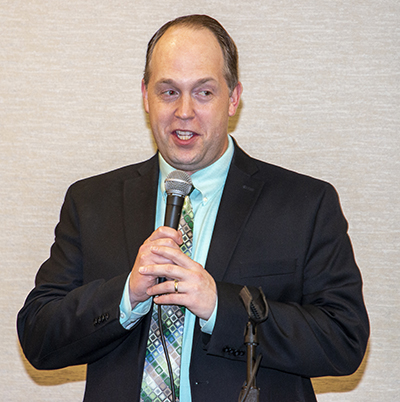 Jim Rigg, archdiocesan superintendent of schools, introduces himself to the Miami Archdiocesan Council of Catholic Women during the group's annual scholarship luncheon, held Feb. 19, 2022 in Fort Lauderdale.