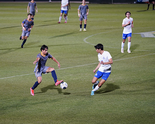 Belen Jesuit's Enzo Fernandez controls a pass during the Wolverines' defense of last year's state championship, a 1-0 defeat of Panama City Beach's Arnold High, Feb. 26, 2022.