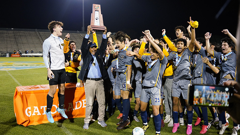 Belen Jesuit Prep's soccer team celebrate after winning their second consecutive state championship with a 1-0 defeat of Panama City Beach's Arnold High, Feb. 26, 2022.