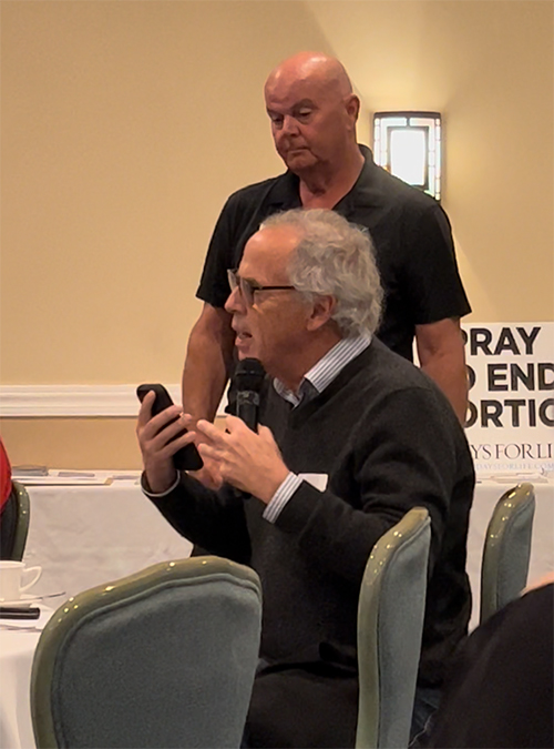 Luncheons4Life organizers Tom Walker, top, and Paul Herron take a turn at the mic at Tropical Acres Steakhouse in Fort Lauderdale in January 2022. Herron heads the luncheons for Palm Beach County.

He encourages everyone to not give up on adult children.  
"We have to tell them about the importance and value of chastity and abstinence, and the right time and place to share that true, mature adult love within the context of a holy marriage. It's just really something that we have to do because everything else is trying to recover from not having done that. When you think about all the things we have to do, it’s all after the fact."