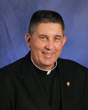 Father Luis Garcia, marking 25 years of priesthood.