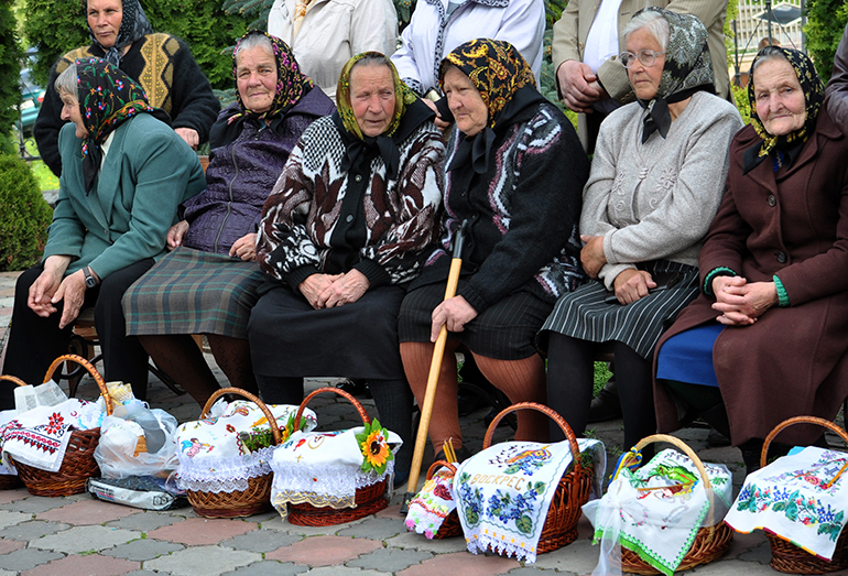 Ukrainian elders wait to have their Easter baskets blessed in happier times.
