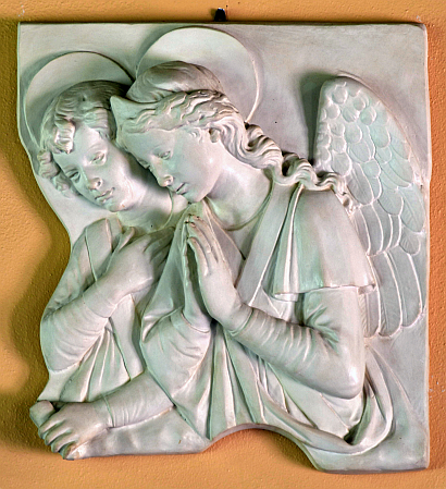 One of two angel bas-reliefs at St. Philip Neri Church.