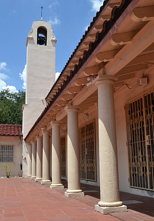 Colonnaded memorial patio has paver bricks honoring prominent members.