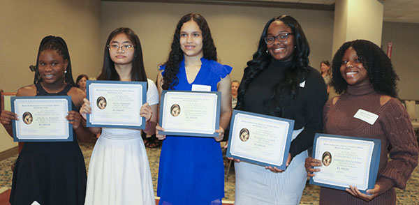 Five girls who received scholarships valued at ,000 each from the Miami Archdiocesan Council of Catholic Women pose with their certificates. The scholarship money will help the girls, all attending Catholic elementary schools. Shown, from left, are Yardora Bayard of St. Mary Cathedral School, Julie Nguyen of St. Helen School, Astrid Cadevilla of Our Lady Queen of Martyrs School, Rosedele Joseph of St. James School and Amanda Desravines of Annunciation School. 

The presentation took place on the second day of the MACCW's 62 annual convention, held April 29-May 1, 2022, in Deerfield Beach.