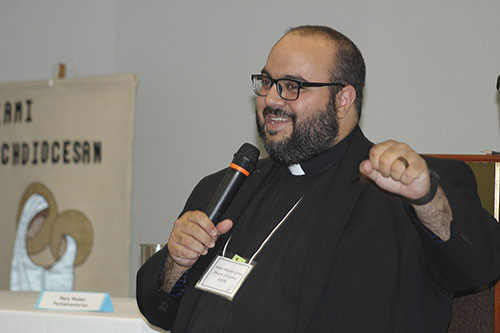 Father Matthew Gomez, vocations director for the Archdiocese of Miami, speaks April 30, 2022, the second day of the Miami Archdiocesan Council of Catholic Women's 62nd annual convention, held April 29-May 1, 2022, in Deerfield Beach.